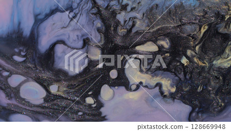 Splash art. Ink background. Defocused purple yellow color liquid dark black shiny stains floating on acrylic creative abstraction. Splash art. Ink background. Defocused purple yellow color liquid dark black shiny stains floating on acrylic creative abstraction. 128669948