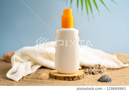 Sun care bottles on wood stand 128669965