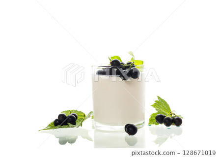 Sweet homemade yogurt with berries on white background Sweet homemade yogurt with berries on white background 128671019