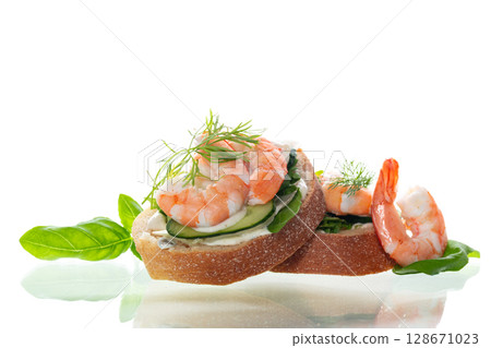 Diet sandwich with seafood on white background Diet sandwich with seafood on white background 128671023