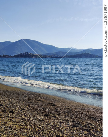 beautiful landscape of a sandy beach on the sea beautiful landscape of a sandy beach on the sea 128671997
