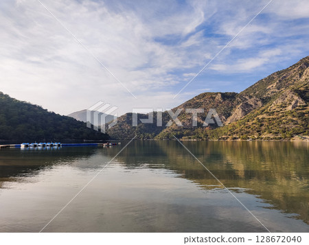 beautiful landscape of the lake against the background of mountains beautiful landscape of the lake against the background of mountains 128672040