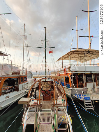 beautiful ships and boats are moored near the shore 128672106