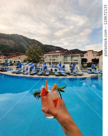 close up of a beautiful fruity alcoholic cocktail close up of a beautiful fruity alcoholic cocktail 128672135