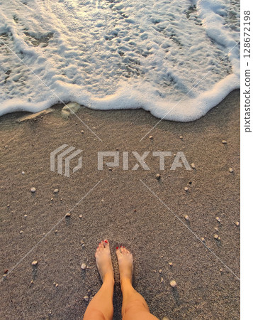 close up of bare feet on the beach close up of bare feet on the beach 128672198