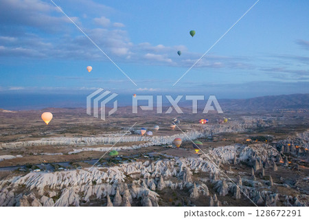 beautiful scenery flight of balloons in the mountains of Cappadocia in love valley 128672291