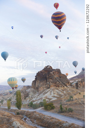 beautiful scenery flight of balloons in the mountains of Cappadocia in love valley 128672292