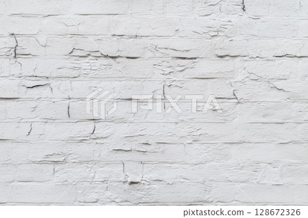 Clean white brick wall with subtle cracks and peeling paint offers perfect neutral texture for backgrounds, mockups, or design projects Clean white brick wall with subtle cracks and peeling paint offers perfect neutral texture for backgrounds, mockups, or design projects 128672326