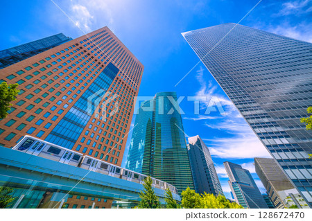 Tokyo cityscape in Japan: Extreme heat...View of Shiodome business district and Yurikamome line...Towards a new era = July 20th 128672470