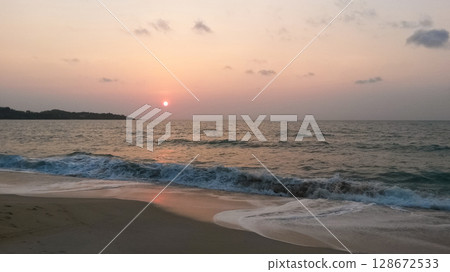 beautiful dramatic landscape of sunset on the sea beach beautiful dramatic landscape of sunset on the sea beach 128672533