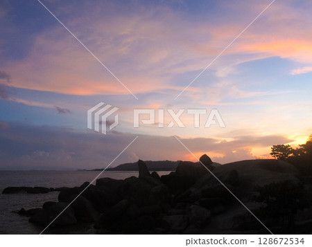 beautiful dramatic landscape of sunset on the sea beach beautiful dramatic landscape of sunset on the sea beach 128672534
