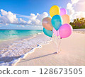 Iridescent Balloons on Tropical Beach Scene 128673505