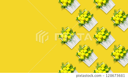 Tennis background. Sport composition with yellow, tennis balls in a white, wooden boxes with green branches on yellow background with copy space. Summer, tennis competition. Flat lay Tennis background. Sport composition with yellow, tennis balls in a white, wooden boxes with green branches on yellow background with copy space. Summer, tennis competition. Flat lay 128673681
