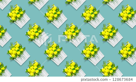 Tennis background. Seamless pattern with repeating yellow, tennis balls in a white, wooden boxes with green branches on blue background. Summer, tennis competition. Flat lay Tennis background. Seamless pattern with repeating yellow, tennis balls in a white, wooden boxes with green branches on blue background. Summer, tennis competition. Flat lay 128673684