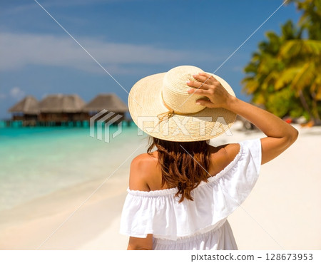 Beautiful Woman on Tropical Beach 128673953
