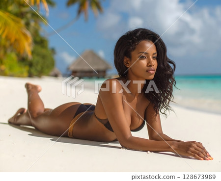 Beautiful Woman on Tropical Beach 128673989