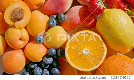various fresh fruits background 128674932