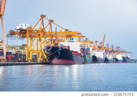 Crane and cargo ship at port in Bangkok City of Thailand. 128675752