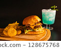 delicious hamburger and juice 128675768