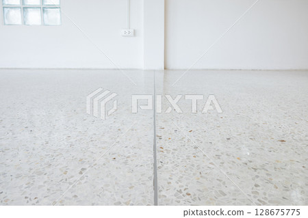 Terrazzo floor and dividing strips suit for background. Terrazzo floor and dividing strips suit for background. 128675775