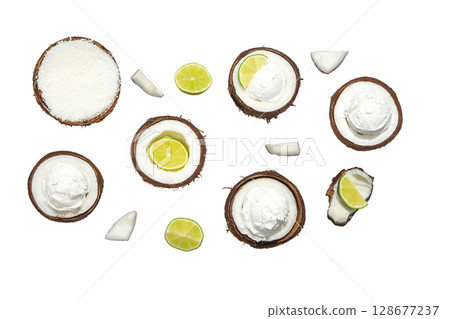 Coconut halves filled with lime and coconut cream, isolated on white, PNG Coconut halves filled with lime and coconut cream, isolated on white, PNG 128677237