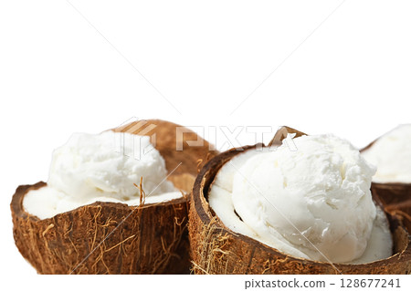 Coconut ice cream in shells, isolated on white, PNG 128677241