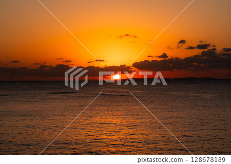 Okinawa sunset and silhouette Okinawa sunset and silhouette 128678189