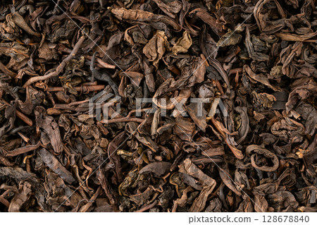 Oolong tea leaves close-up 128678840