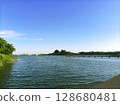 Lake with clouds on a sunny summer day 128680481