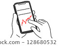 The hands of someone checking rising stocks 128680532