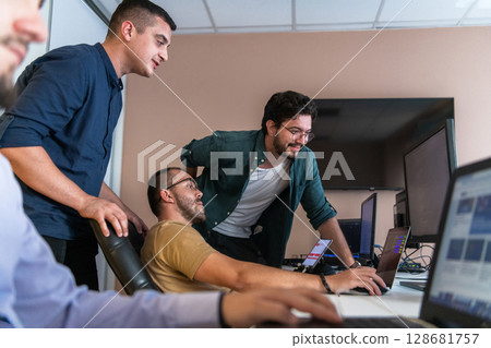 Collaborative Minds: A Team of Programmers Tackling Challenges Together in the Office. Collaborative Minds: A Team of Programmers Tackling Challenges Together in the Office. 128681757