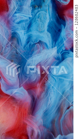 Vapor texture. Ink water. Defocused blue red color swirling fog flow mix liquid spreading on abstract creative fume art background. Vapor texture. Ink water. Defocused blue red color swirling fog flow mix liquid spreading on abstract creative fume art background. 128682483