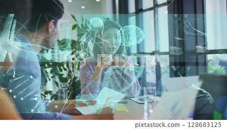 Image of diverse business people talking over data processing 128683125