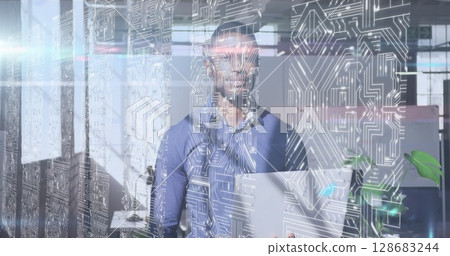 Image of lights over african american men in server room 128683244