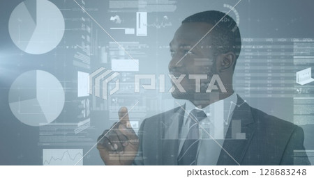 Statistical data processing against african american businessman touching an invisible screen Statistical data processing against african american businessman touching an invisible screen 128683248