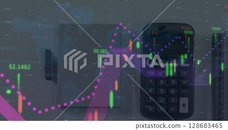 Image of financial data processing over calculator on desk 128683465