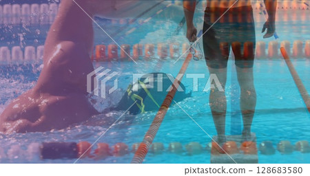 Image of caucasian man swimming in pool 128683580