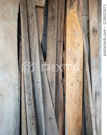 Weathered Reclaimed Wood from an Old House. Weathered Reclaimed Wood from an Old House. 128683821