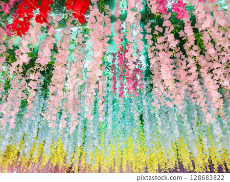 Vibrant Artificial Flower Decor at Temple Archway. Vibrant Artificial Flower Decor at Temple Archway. 128683822