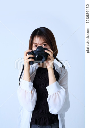 單反相機和女人形象 128684480