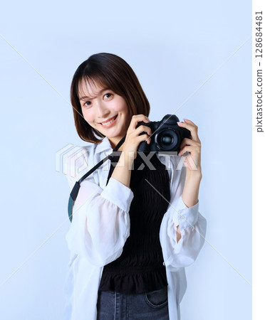 單反相機和女人形象 128684481