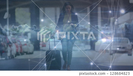 Image of data processing over clouds and biracial businesswoman walking 128684823