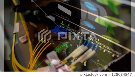 Image of server room over biracial man using vr headset Image of server room over biracial man using vr headset 128684847