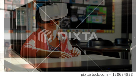 Image of server room over biracial girl using vr headset 128684858