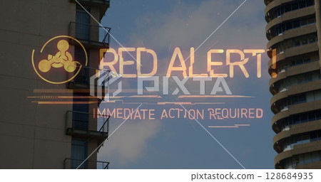 Image of red alert text over cityscape Image of red alert text over cityscape 128684935
