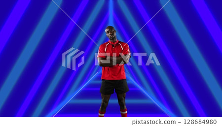 Image of african american male american football player with arms crossed over shapes Image of african american male american football player with arms crossed over shapes 128684980