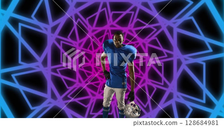 Image of african american male american football player with helmet over shapes 128684981