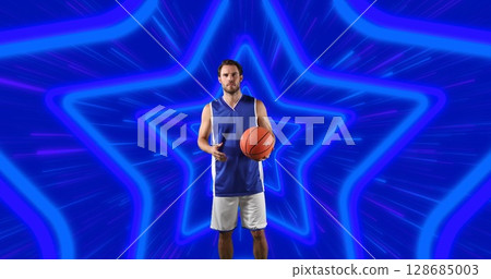 Image of caucasian male basketball player with ball over stars Image of caucasian male basketball player with ball over stars 128685003