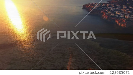 Image of landscape with ocean over landscape 128685071