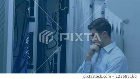 Image of shapes over caucasian male worker inspecting server room Image of shapes over caucasian male worker inspecting server room 128685166